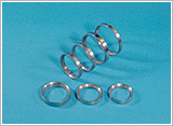 Powder Forged Valve Sheets for Gas Engine with High Adhesive Wear Resistance