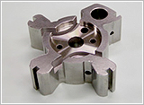 Sintering of Low Cost Variable Cam Timing Rotor by means of Machining at Green Stage