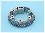 Housing with sprocket having high density and high dimensional accuracy