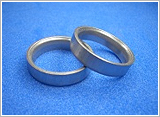 The valve seat material of adding higher wear resistant hard particles