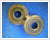 Oil-impregnated Sintered Bearings with Excellent Wear Resistance by Applying Density Gradient
