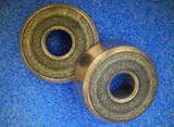Oil-impregnated Sintered Bearings with Excellent Wear Resistance by Applying Density Gradient